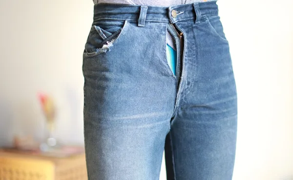 Defective product like these torn at the zipper jeans will hurt brand reputation