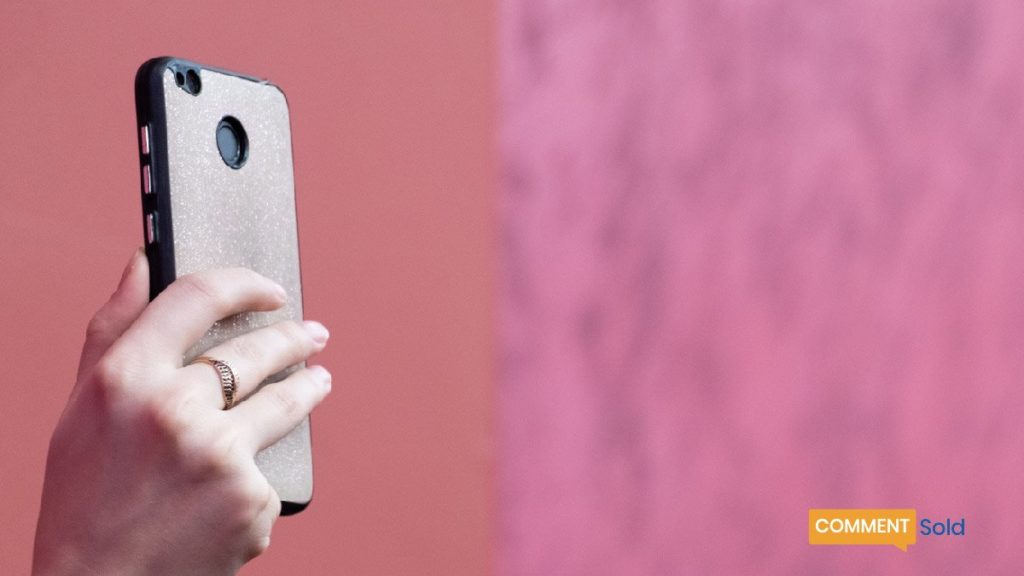 person holding mobile phone