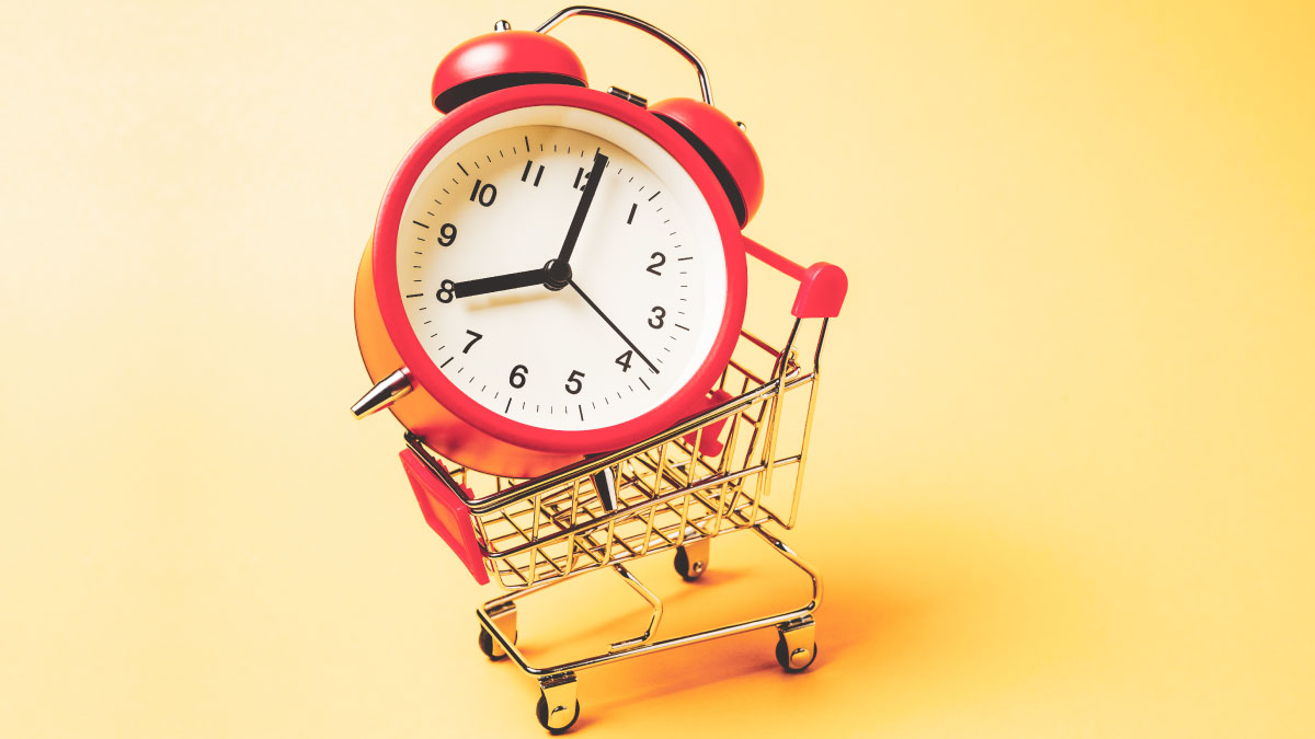 Small shopping cart with a clock inside