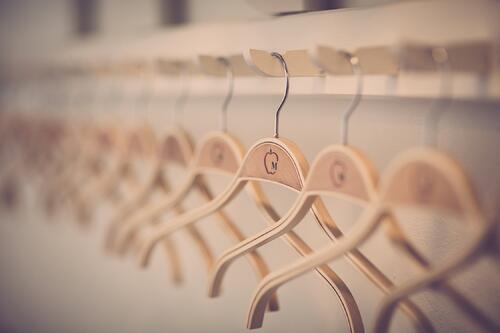 Empty hangers waiting for new apparel inventory